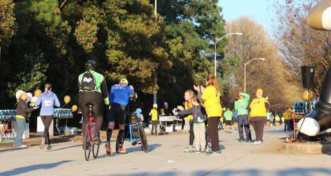 Volunteers cheering on participants