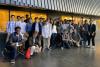 Gwinnett School of Mathematics, Science, and Technology students in the Marcus Nanotechnology Building gallery with Professors Asif Khan and Azadeh Ansari.