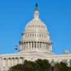 Picture of the US Capitol Building dome with a clear blue sky background.